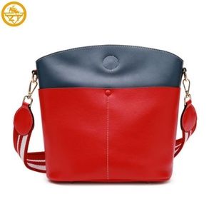 Bucket handbag in hot bicolor high quality leather